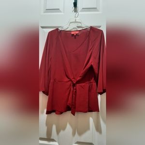 Red blouse with tie at front